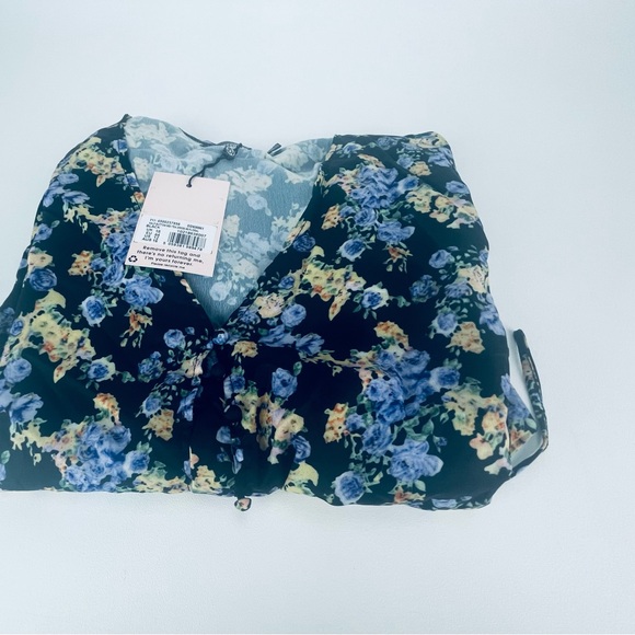 HALF BUTTON MIDI TEA DRESS SS FLORAL
BLACK - Picture 6 of 10